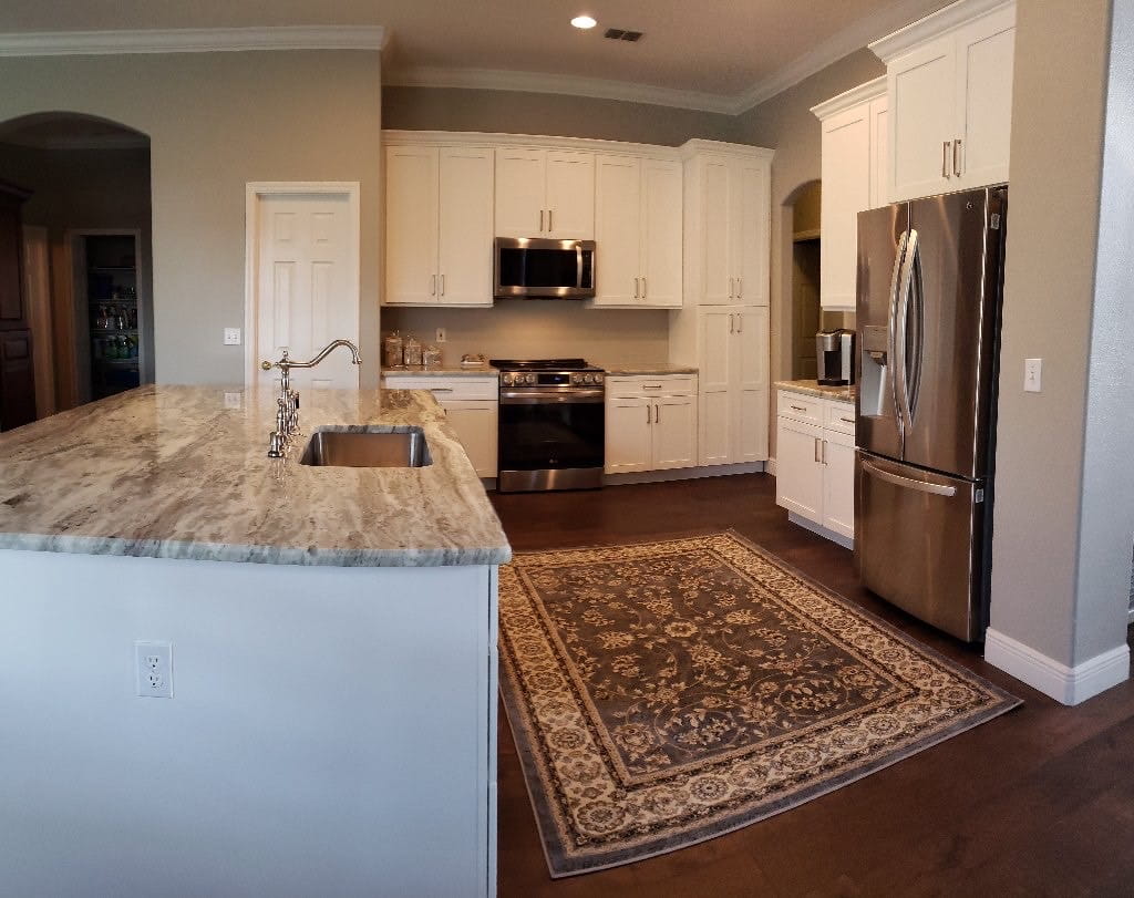 Classic White Kitchen with Marble Island
